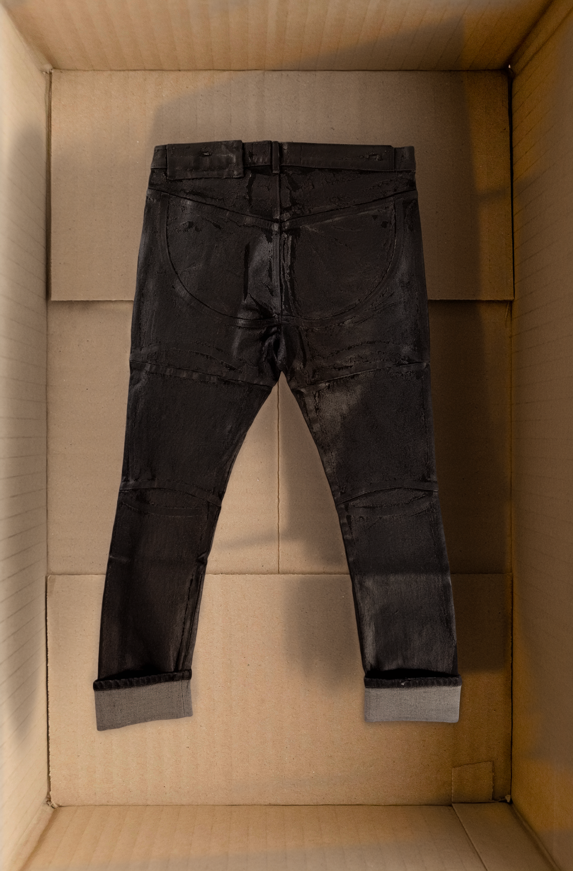 [SM] Anatomical black coated denim trousers