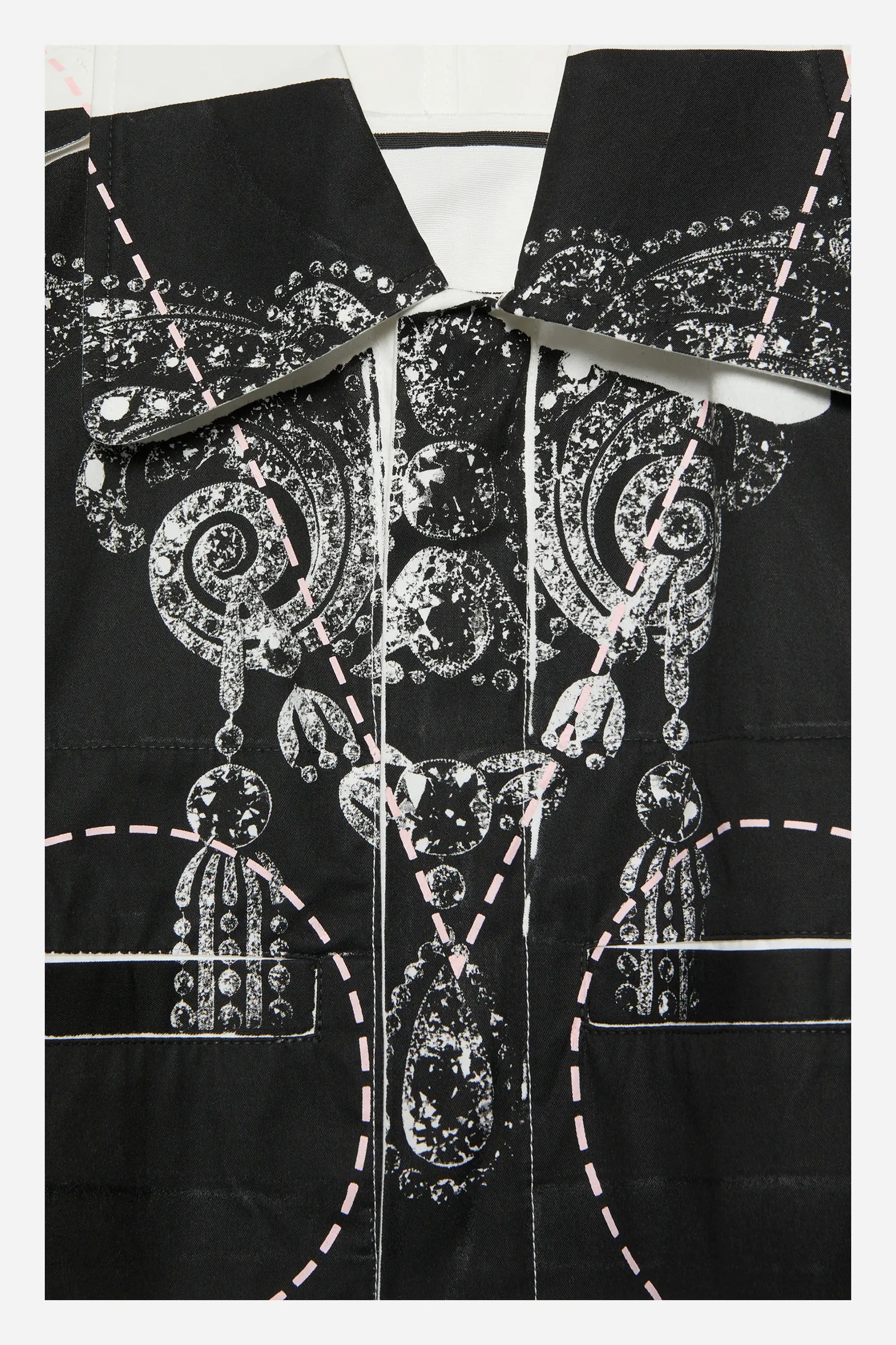 Close-up of the “Jewel” print serigraph from the Sébastien Meunier “Versatile” transformable cotton overall — Chapitre 14 collection.