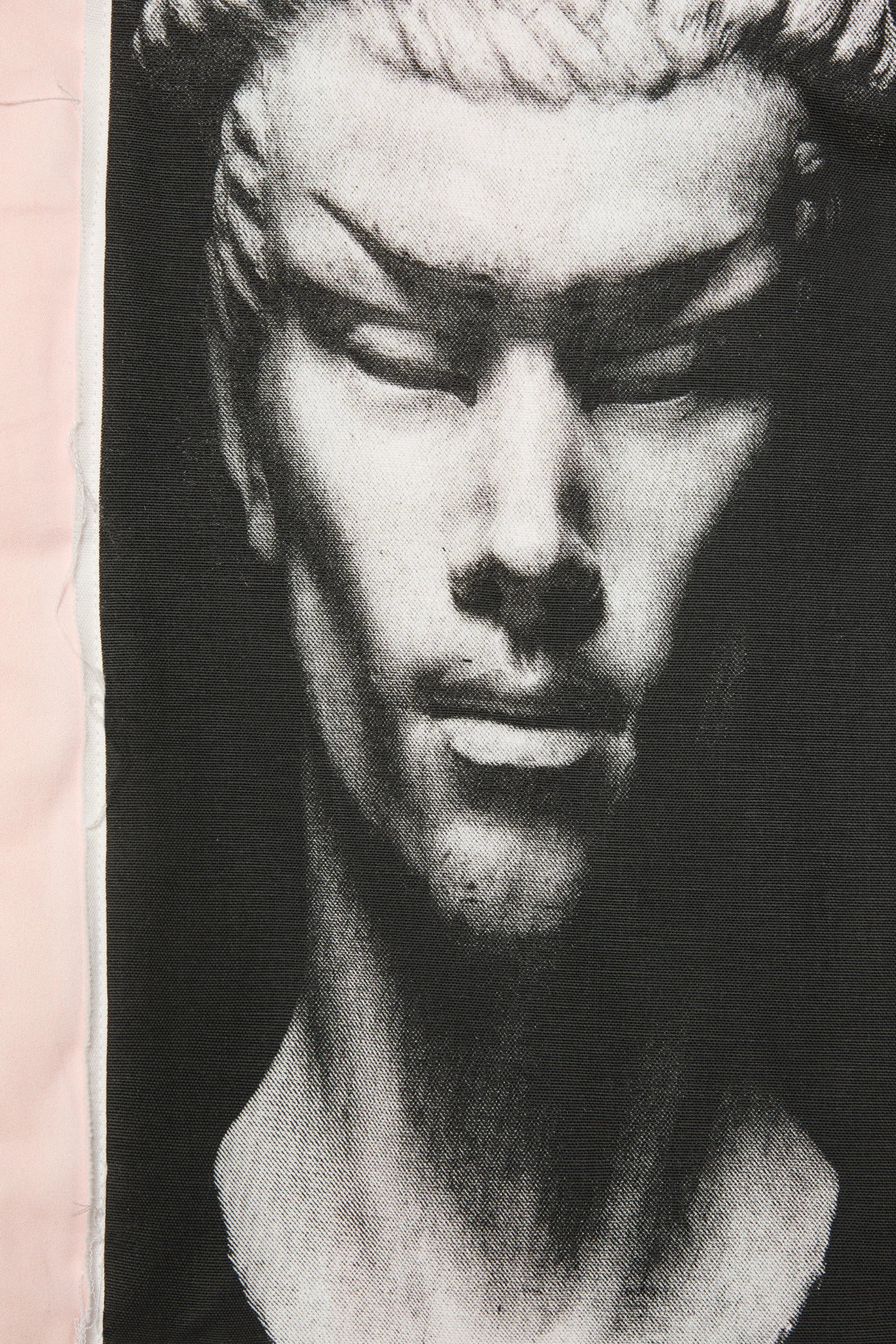 Close-up of the “Moon” print serigraph from the Sébastien Meunier “The Future” transformable cotton overall — Chapitre 14 collection.